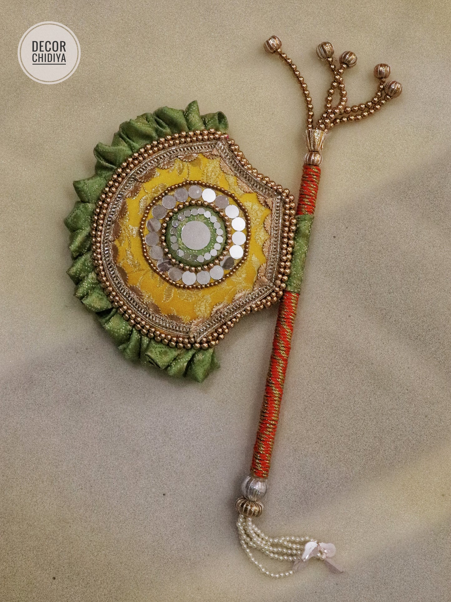 yellow and seagreen Beejana or handfan in Banarasi fabric and mirrorwork detail