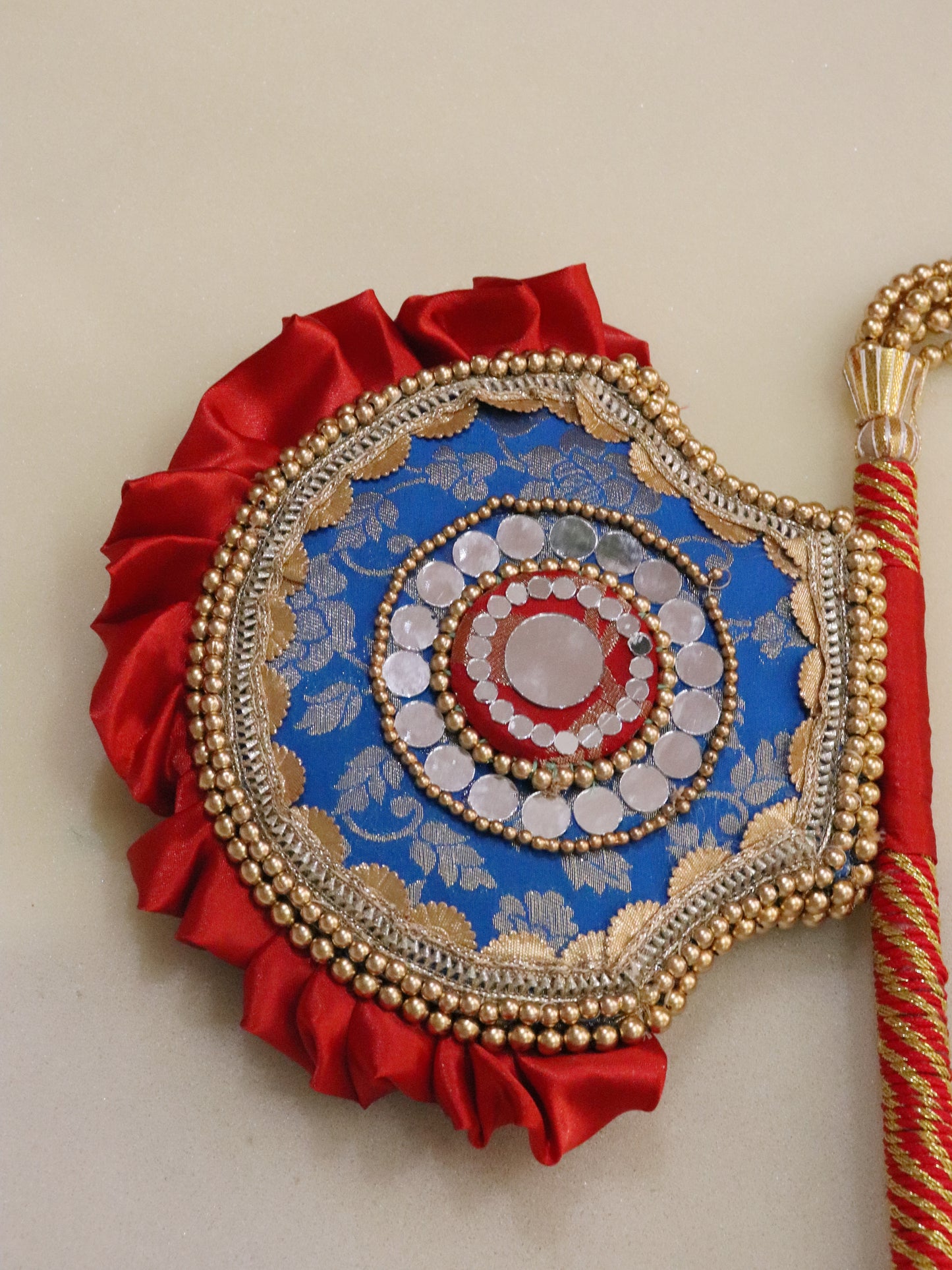 Teal and red - Beejana or handfan in Banarasi fabric and mirrorwork detail