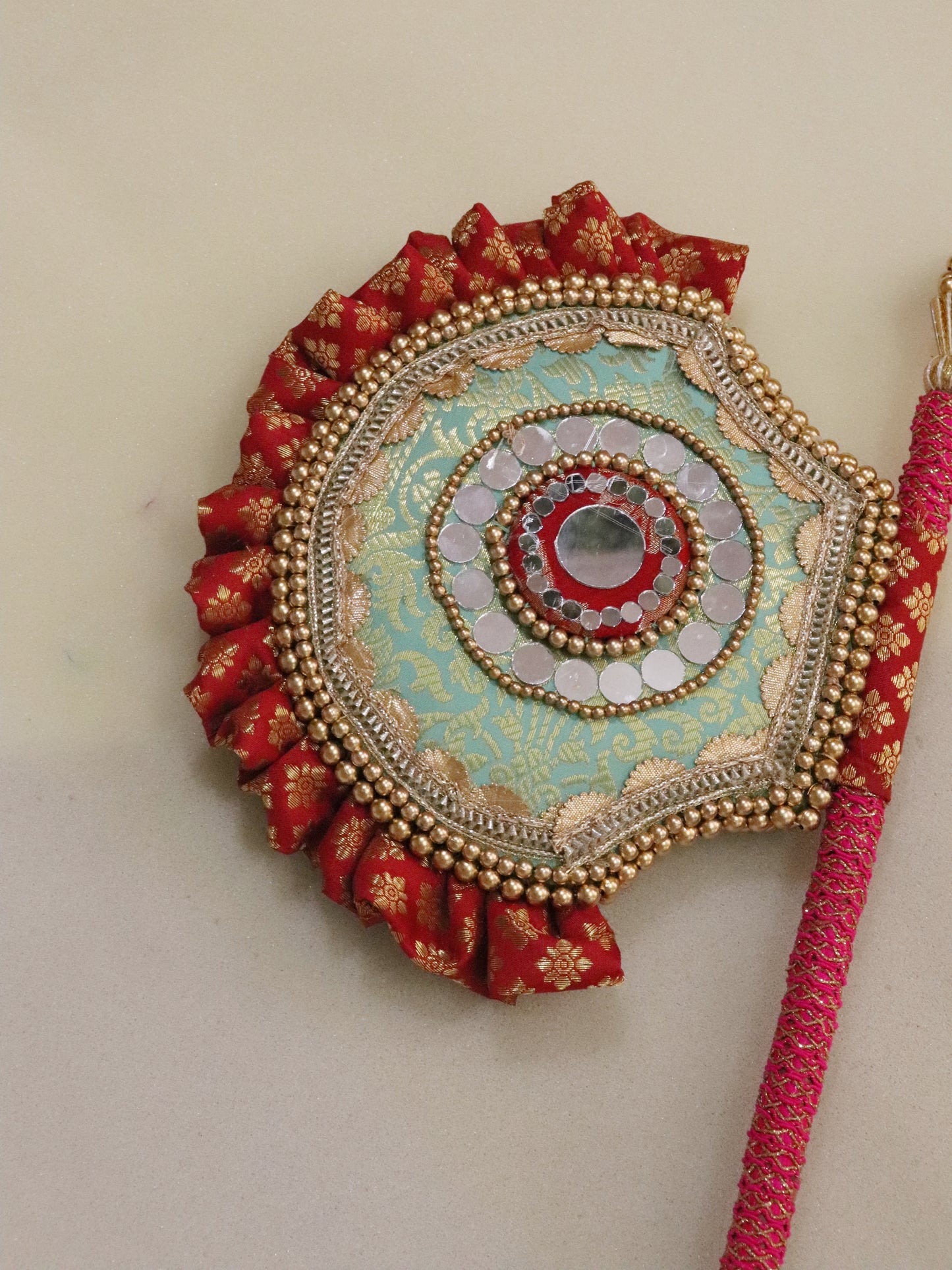 seagreen and Red - Beejana or handfan in Banarasi fabric and mirrorwork detail