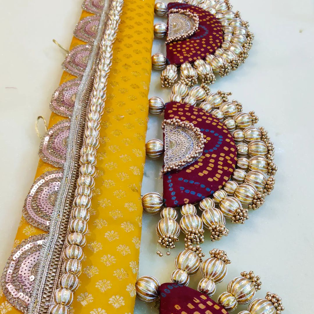 Classic Adhruv or halfmoon Toran - Surajmukhi aur laal- small motifs brocade toran