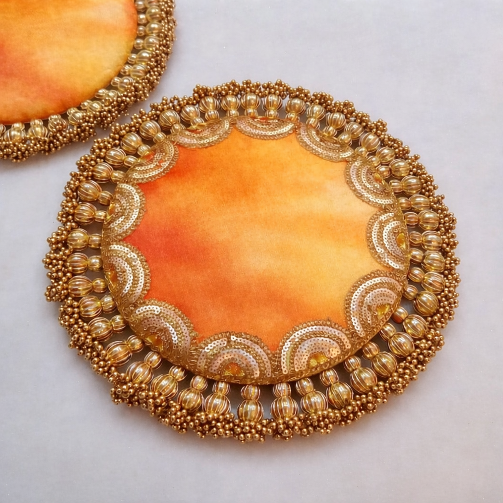 Rangeen Soneri Parijat Placemat – Yellow-Orange Alcohol Ink Fabric with Golden Tassels