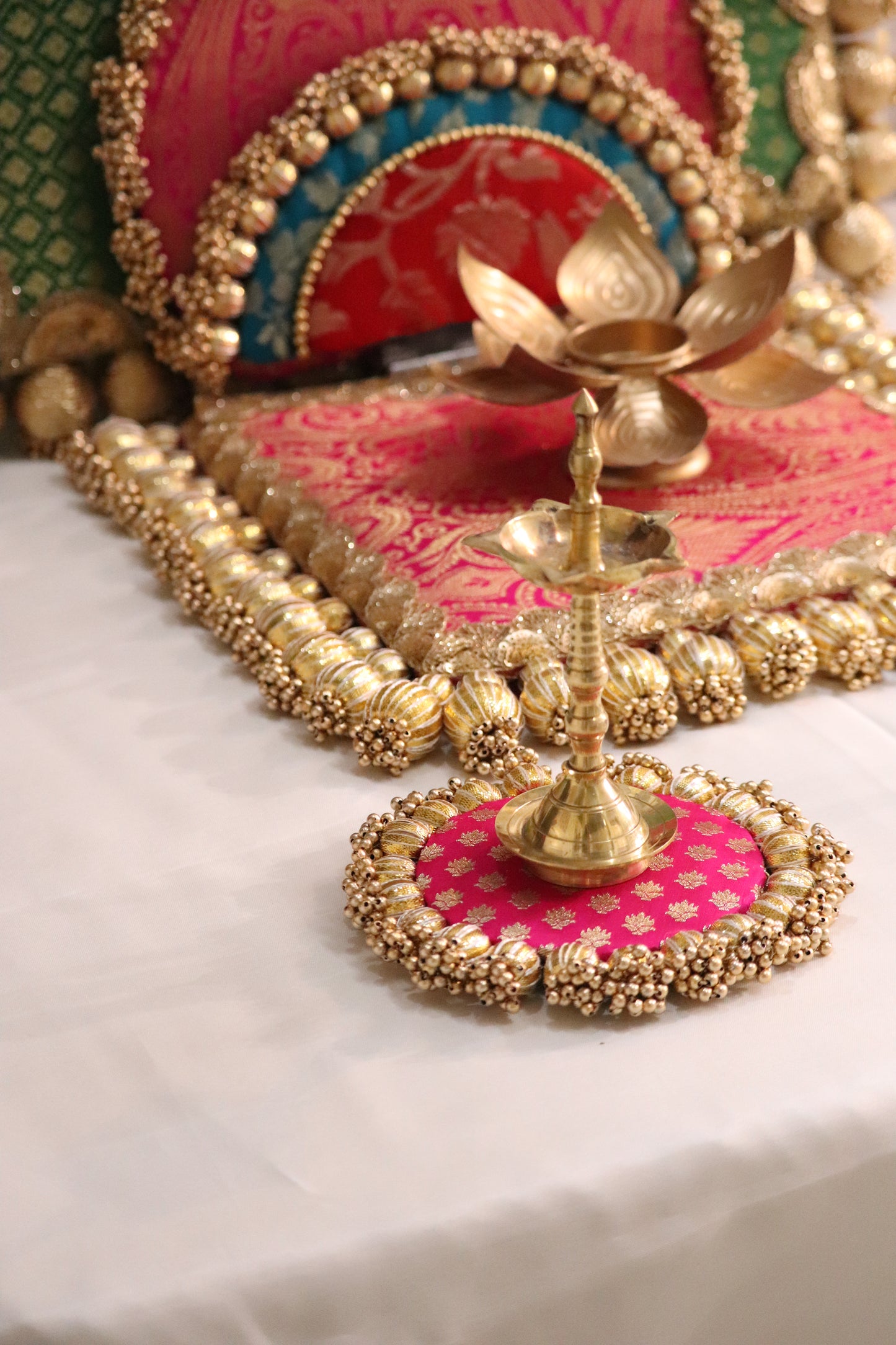 Regal Reverie: Leaf Green Square & Rani Pink Singhasana-Themed Placemat Set