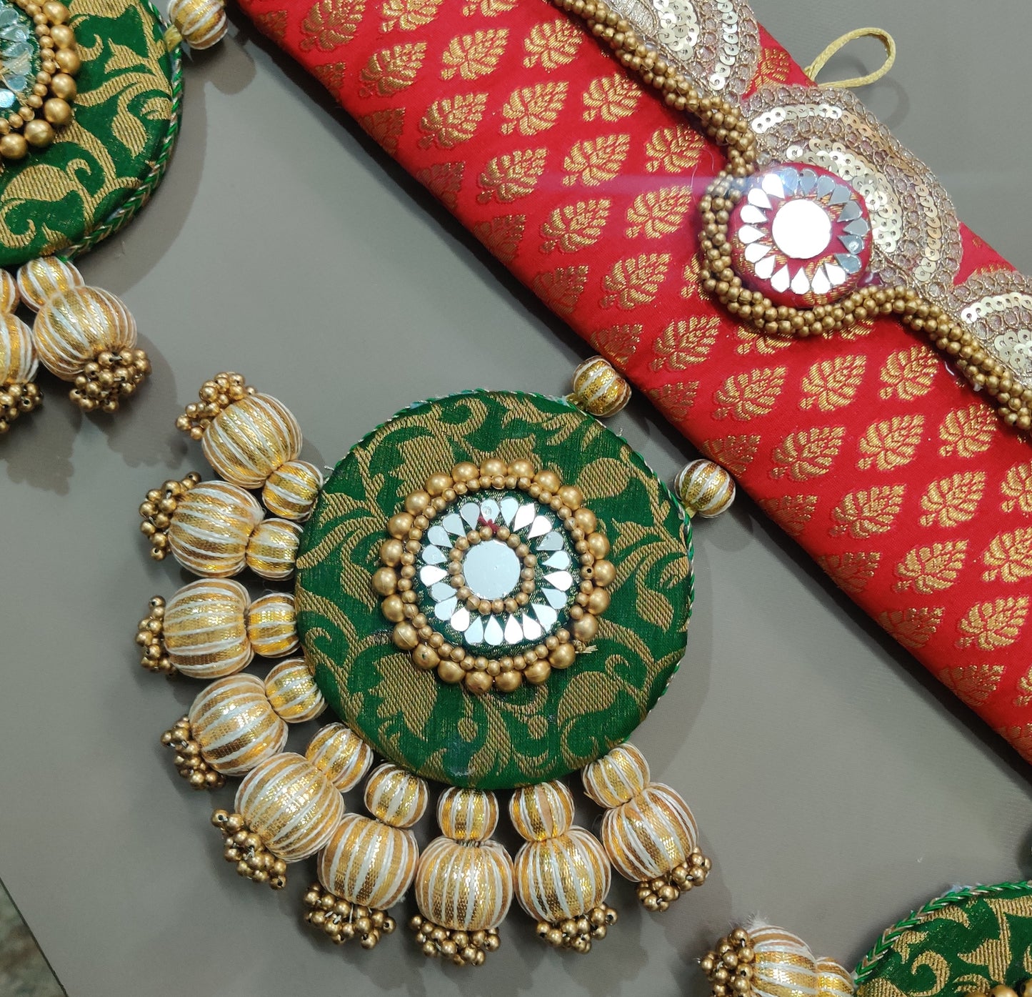 Exclusive - Ardhchandrama or Circular pendant Toran - Red hara - small motifs brocade toran