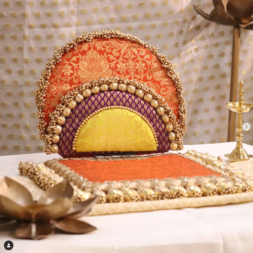 Orange brocade and gota patti singhasana