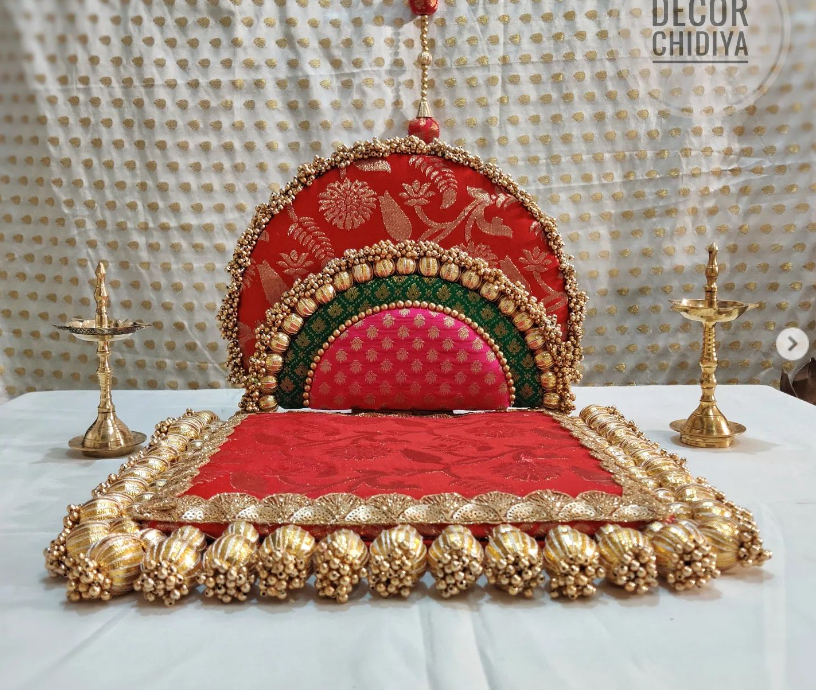Red brocade and gota patti singhasana