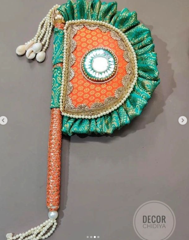 Orange and seagreen Beejana or handfan in Banarasi fabric and mirrorwork detail