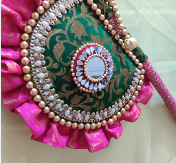 Emerald green and magenta Beejana or handfan in Banarasi fabric and mirrorwork detail