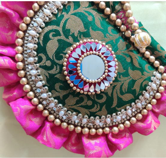 Emerald green and magenta Beejana or handfan in Banarasi fabric and mirrorwork detail