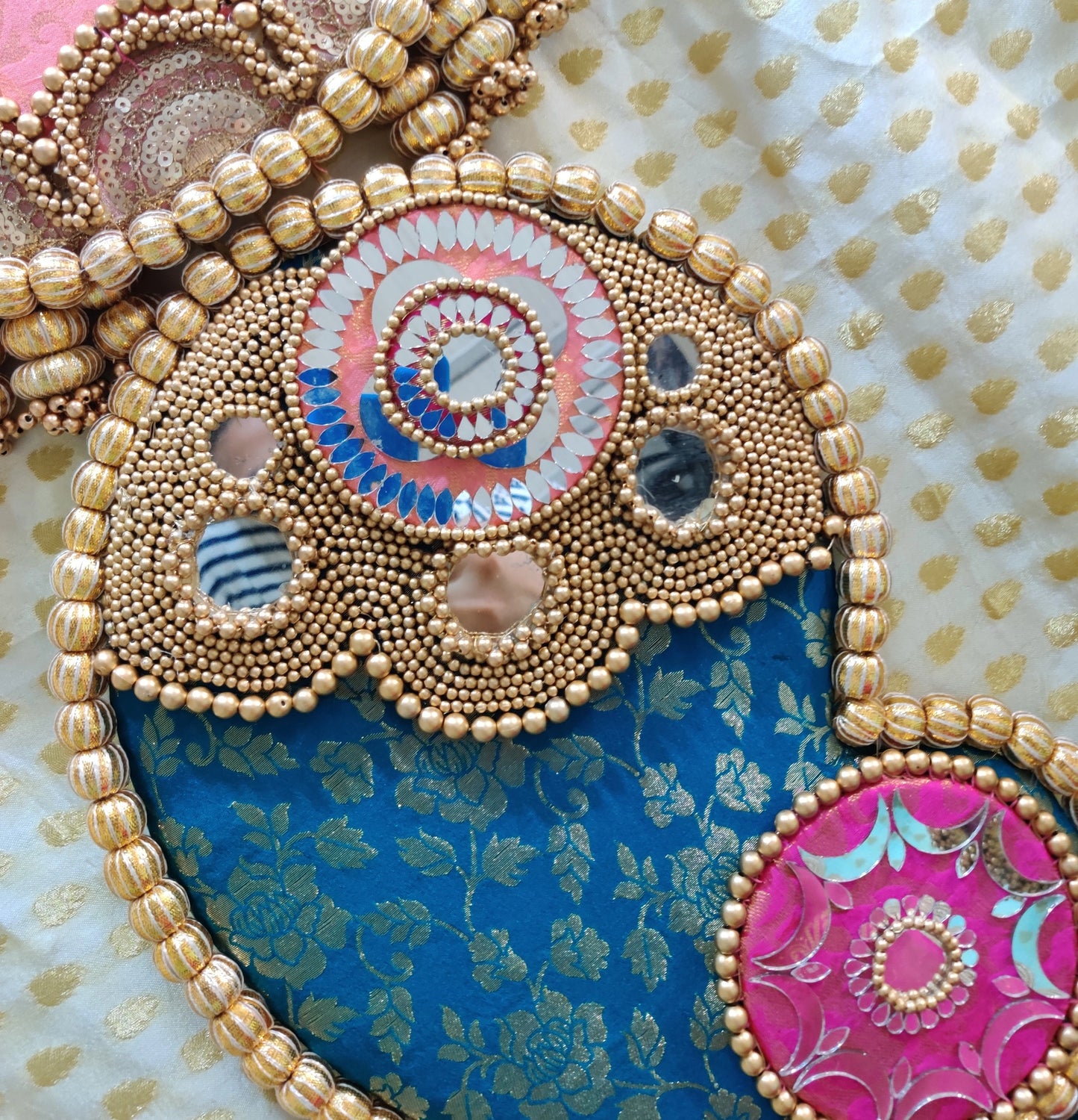 Raktund: Turquoise and Light Pink Wall Hanging