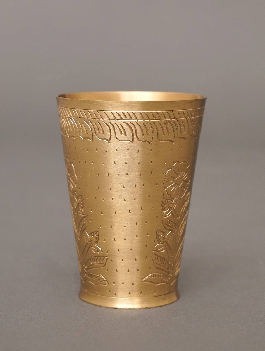 Antique hand carved brass glass