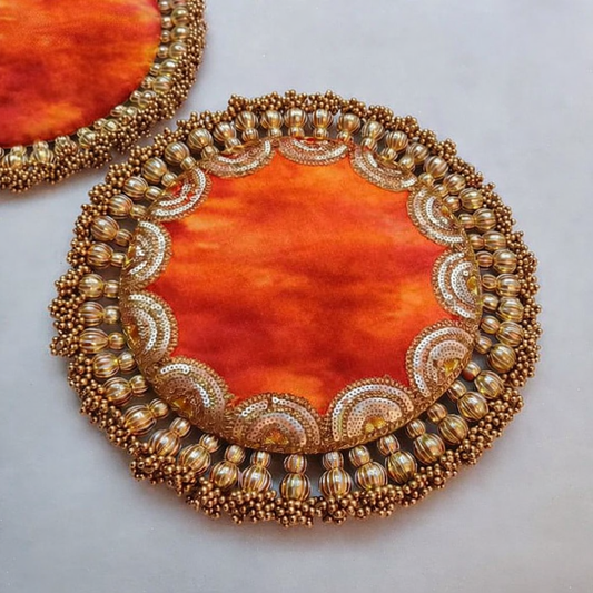 Rangeen Soneri Parijat Placemat – red-Orange Alcohol Ink Fabric with Golden Tassels