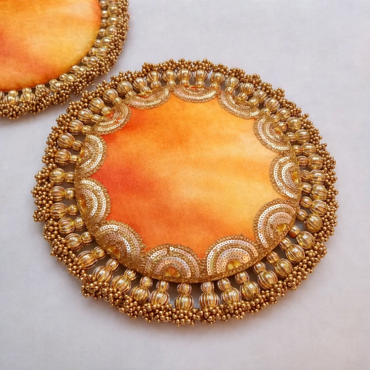 Rangeen Soneri Parijat Placemat – Yellow-Orange Alcohol Ink Fabric with Golden Tassels