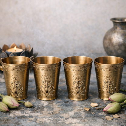Antique hand carved brass glass